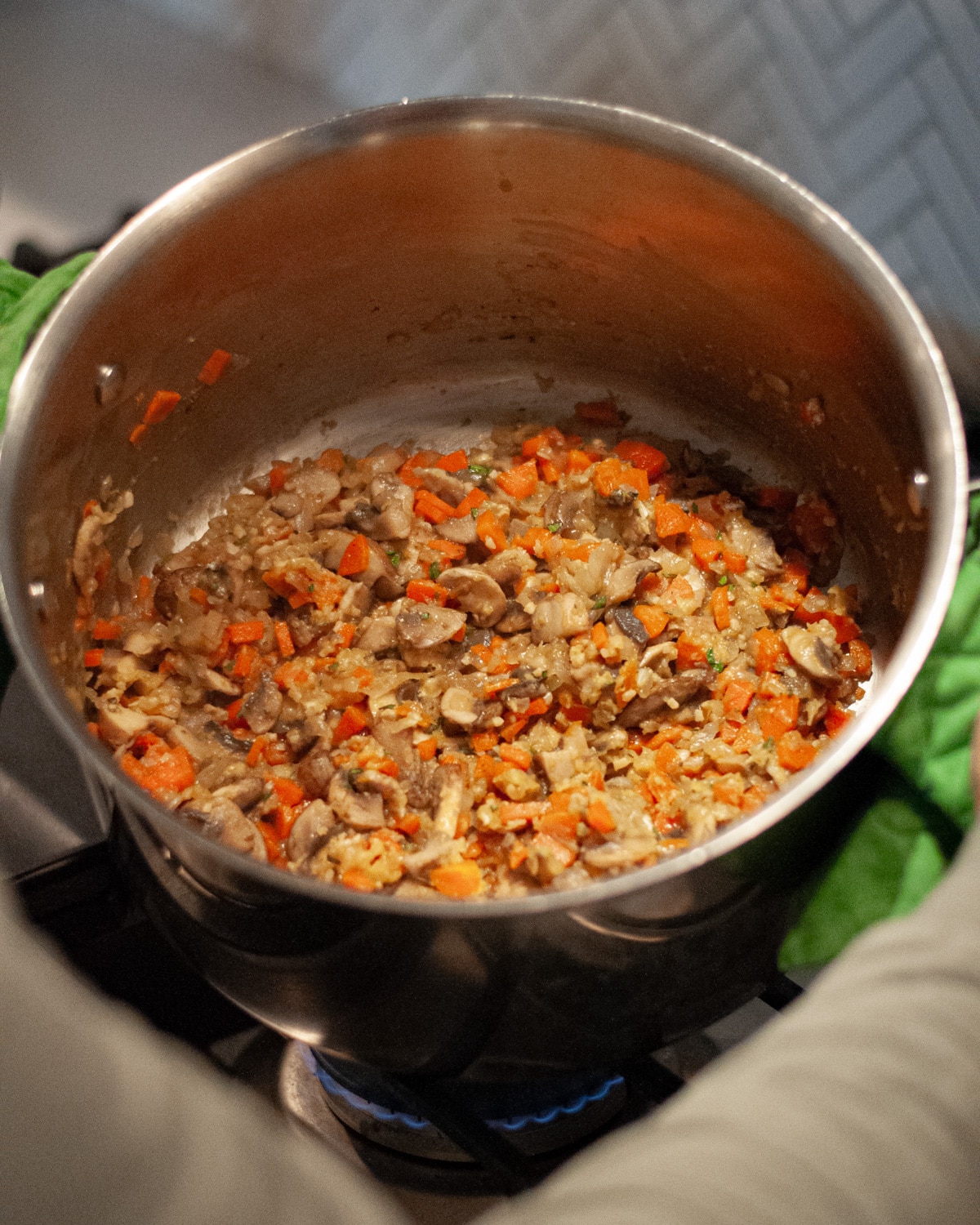 Process shot showing how the flour absorbed the liquid from the sauteed onions, carrots, mushrooms, garlic, and oregano.