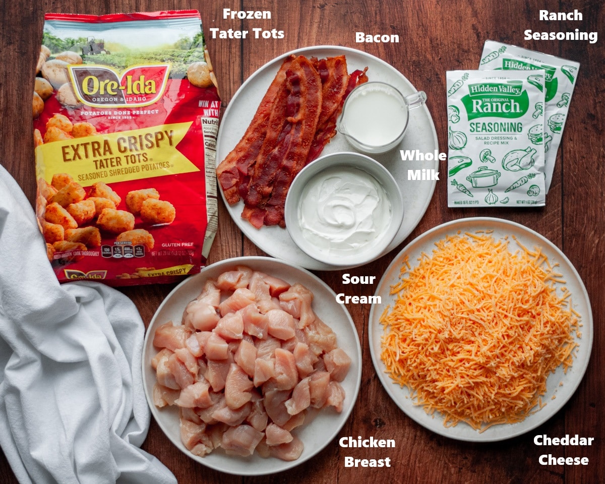 Ingredients needed to make chicken bacon ranch tater tot casserole in the slow cooker.