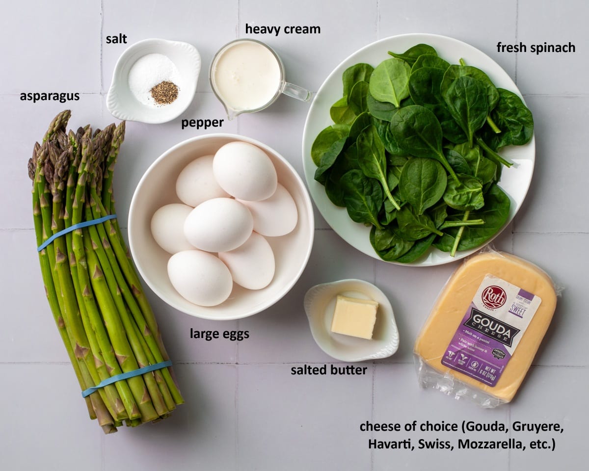 Ingredients needed to make an asparagus spinach frittata.