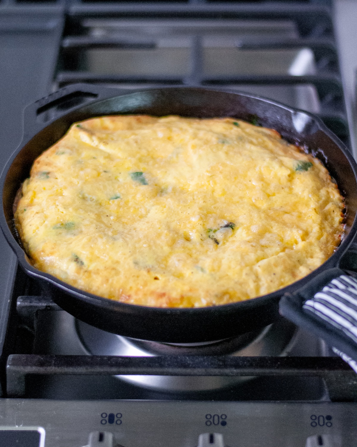 Process shot showing the frittata after baking.