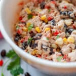 Close up of the mexican tuna salad in a medium mixing bowl.