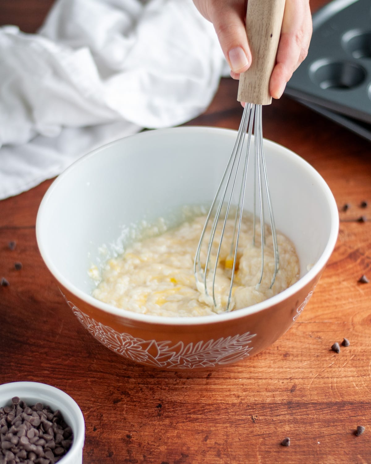 Process shot showing the wet ingredients being whisked together.