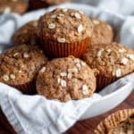 Close up of a bowl filled with banana oat muffins.