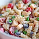 Close up of bacon ranch pasta salad with ranch dressing in a large white bowl.